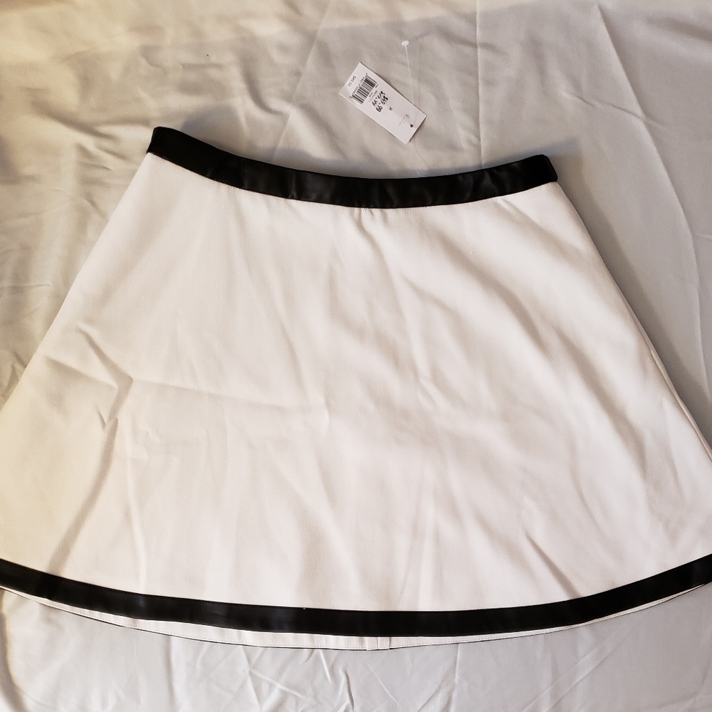 White skirt with leather trim
